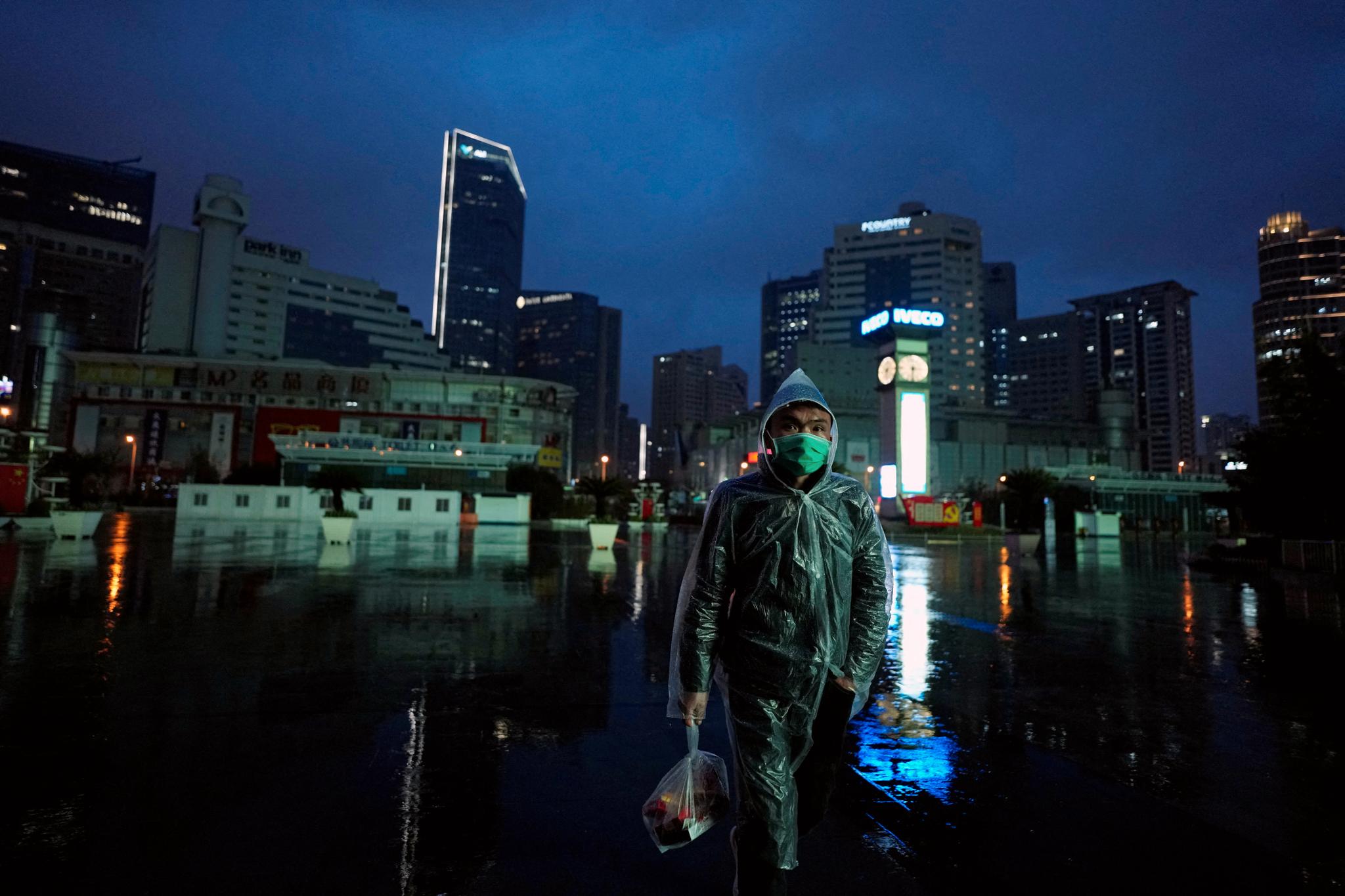  Shanghai residents have been locked inside their apartments for several weeks.  At night they shout from the window.

