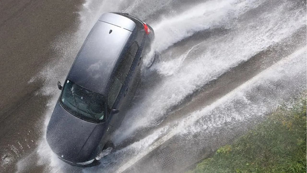 What do you do if your car gets into a “water sheet”?